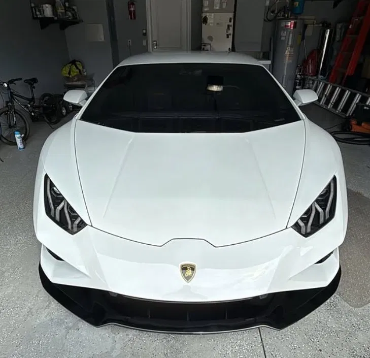 White Lamborghini Huracán detailed in garage